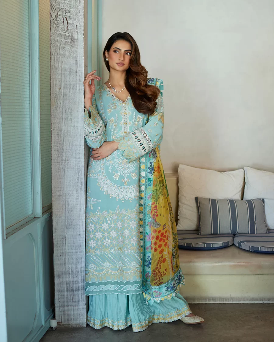 Discover elegant Pakistani suits online at FabCollections. Galina in ice blue lawn, floral motifs, and a printed silk dupatta for a sophisticated look.