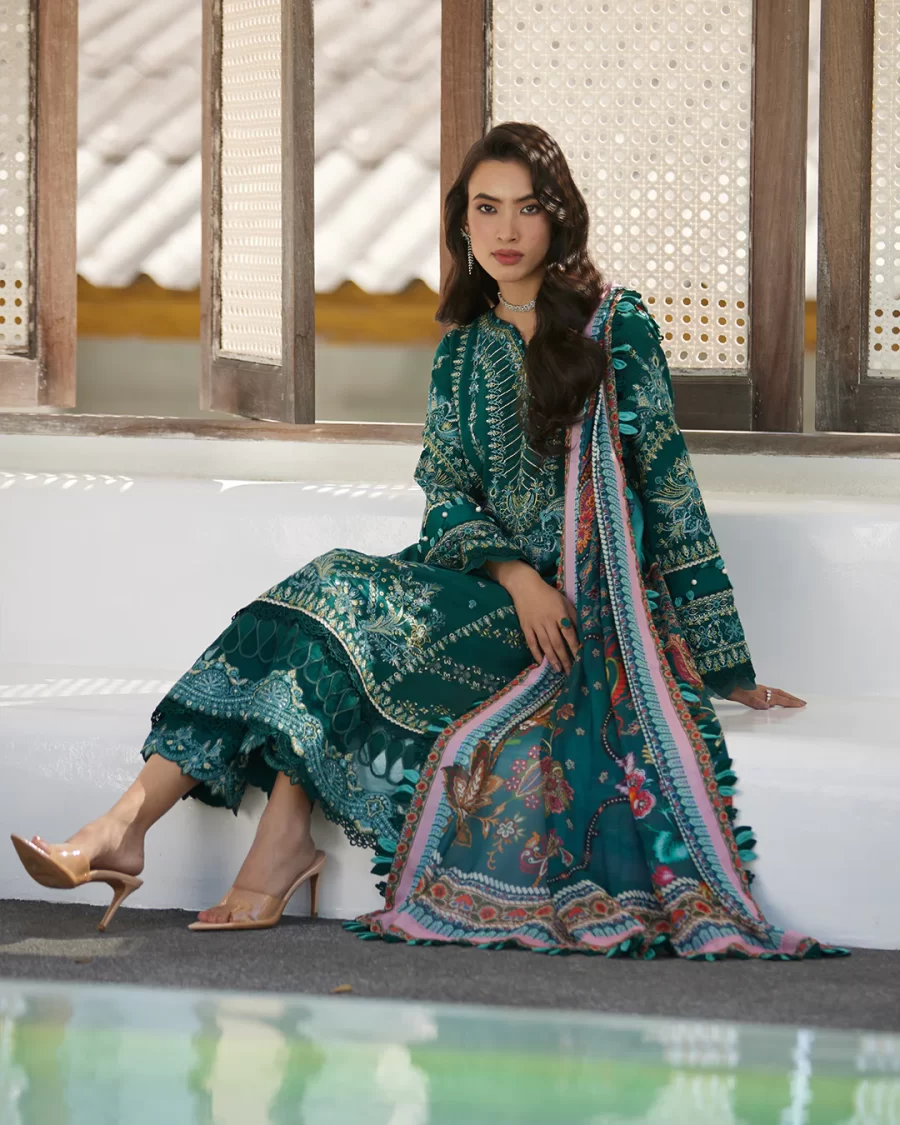 Discover luxurious Pakistani suits online at FabCollections. Featuring botanical motifs, sequins, and a printed silk dupatta for a standout look.