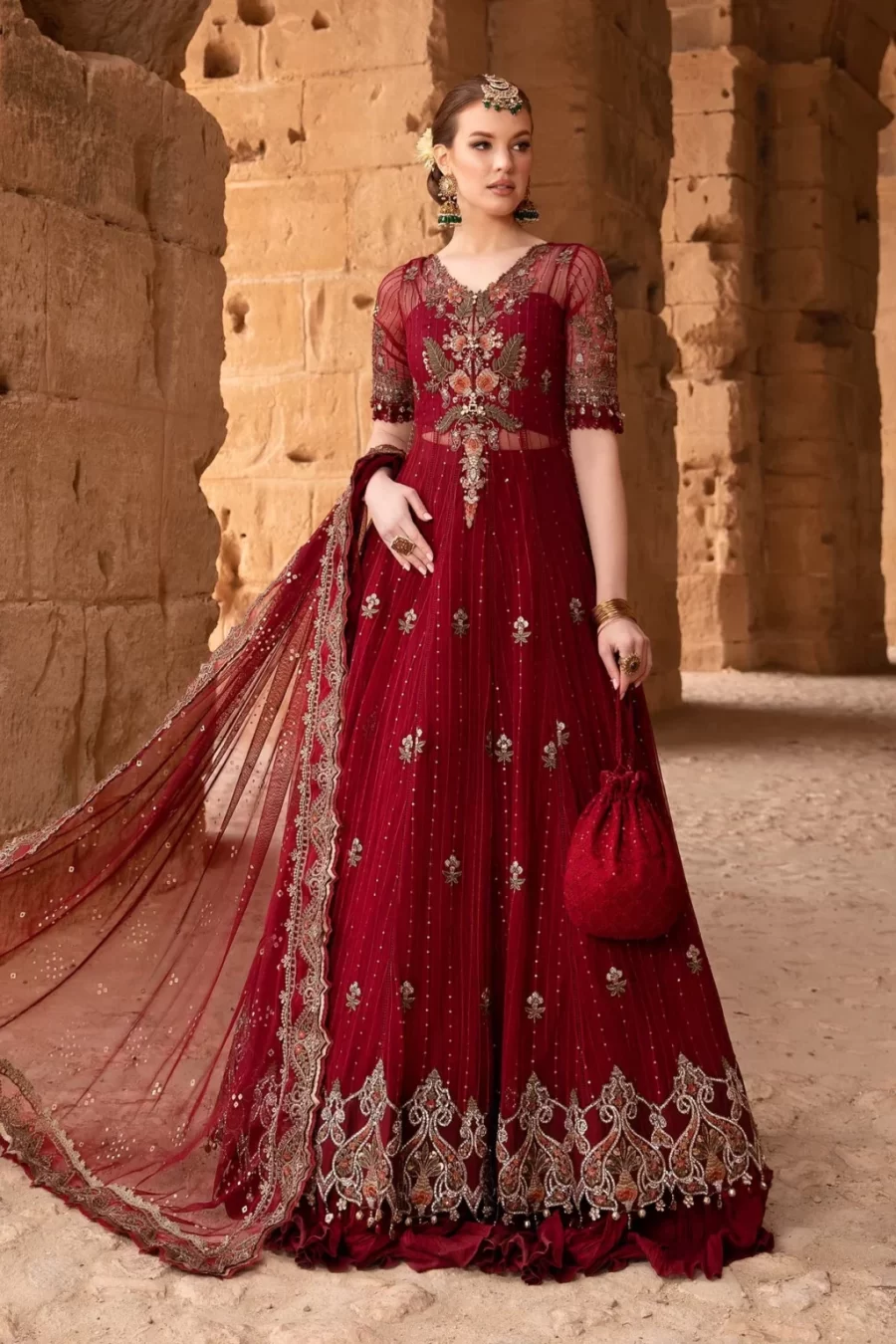 Stylish Karachi Pakistani suits featuring an embroidered net shirt, dyed cambric trouser, and embroidered organza dupatta patti. Free shipping and COD.