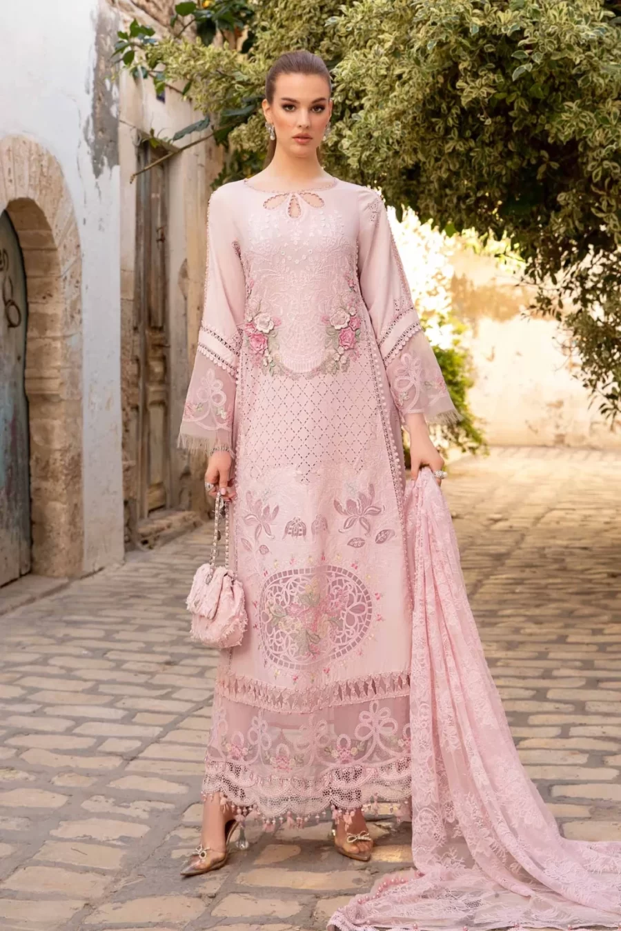 Shop stylish Karachi Pakistani suits at Fabcollections featuring embroidered organza front and sleeves. Free shipping and cash on delivery.