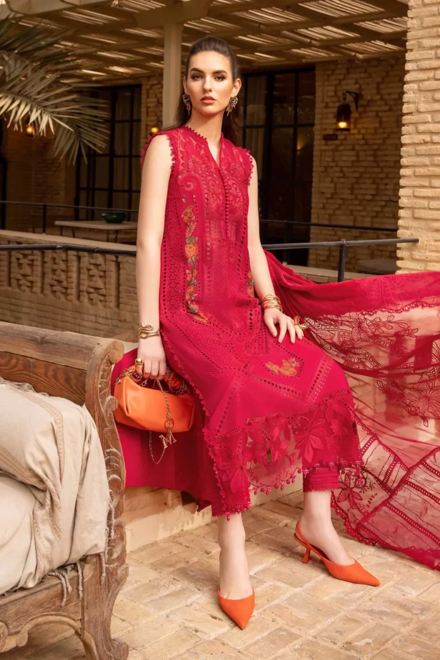 Shop stylish unstitched Pakistani suits at Fabcollections featuring embroidered front patch and side panels. Free shipping and cash on delivery.