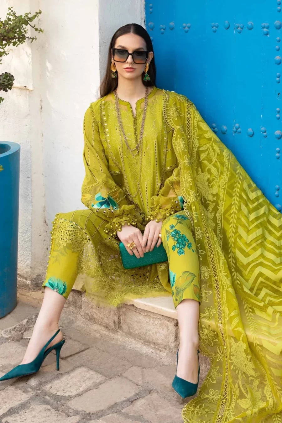 Shop stylish unstitched Pakistani suits with an embroidered ghera patch and printed cambric trouser. Free shipping and cash on delivery.