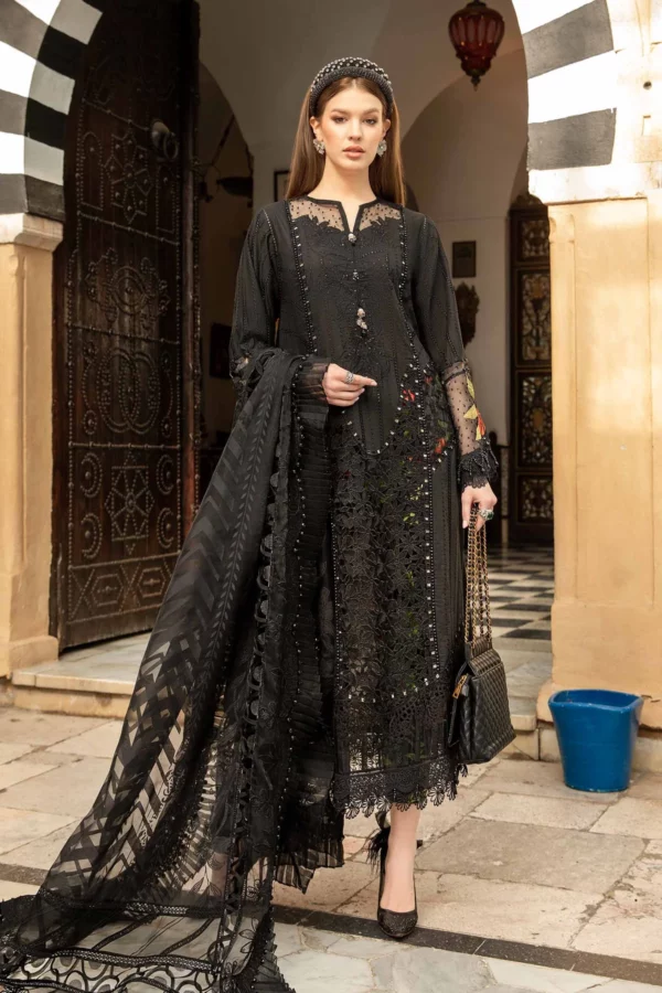 Premium Lahore suits online showcasing embroidered lawn side panels and organza side panel patches. Free shipping and cash on delivery.