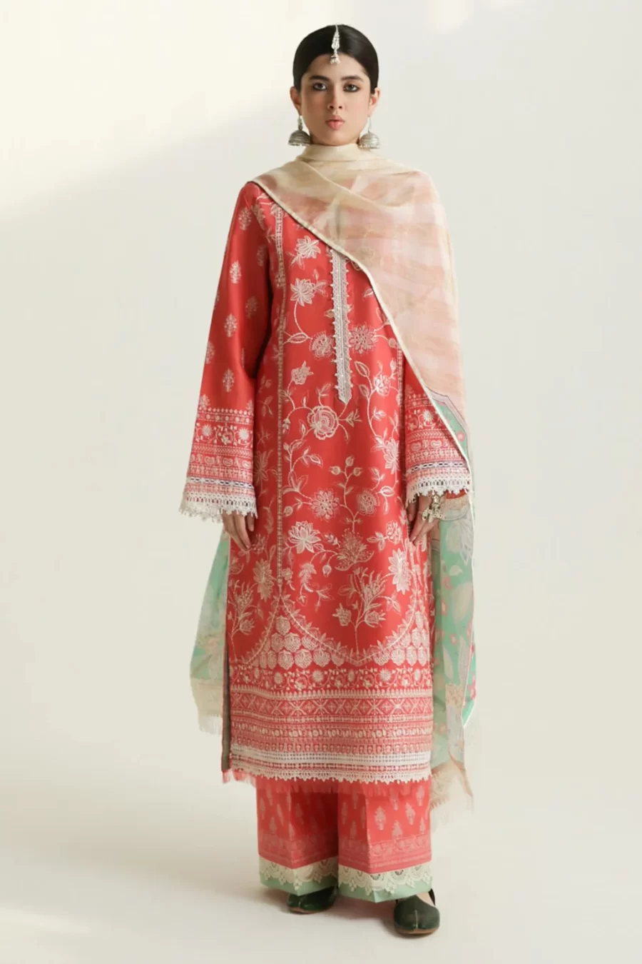 Discover Mahi, a modern pastels 2 piece suit with a foliage embroidered shirt, printed cambric pants, and a printed silk dupatta.