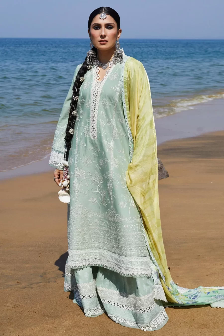 Discover Mahi, a modern pastels 2 piece suit featuring an all-over foliage embroidered shirt, printed cambric pants, and a beautiful silk dupatta.