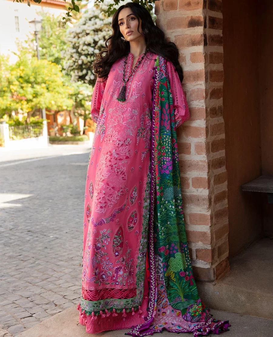 Adorned in coral with intricate embroidery, Clèmence features a printed silk dupatta. Shop elegant Pakistani suits for women at Fabcollections.