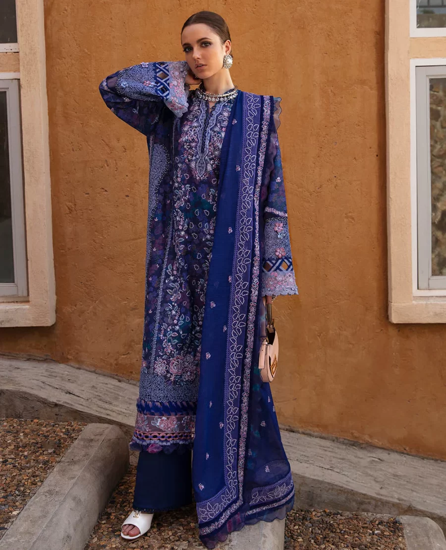 Explore the Lûne collection of Pakistani suits for women. This blue unstitched dress material with starry sequin work and embroidered organza is available at Fabcollection.