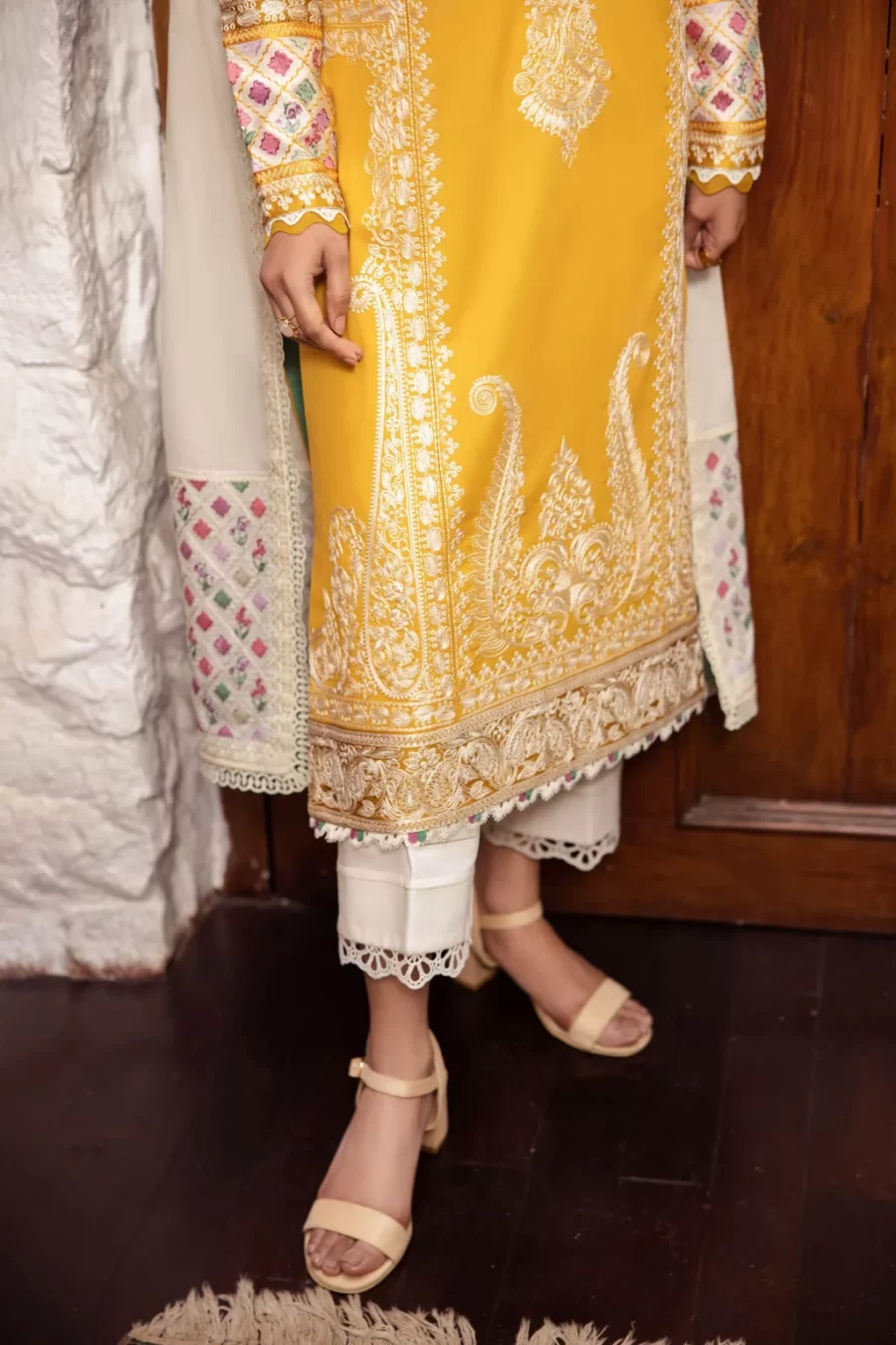 Embrace chic elegance with Karachi Pakistani suits featuring dyed sleeves, embroidered voile duppata, and satin hem border.