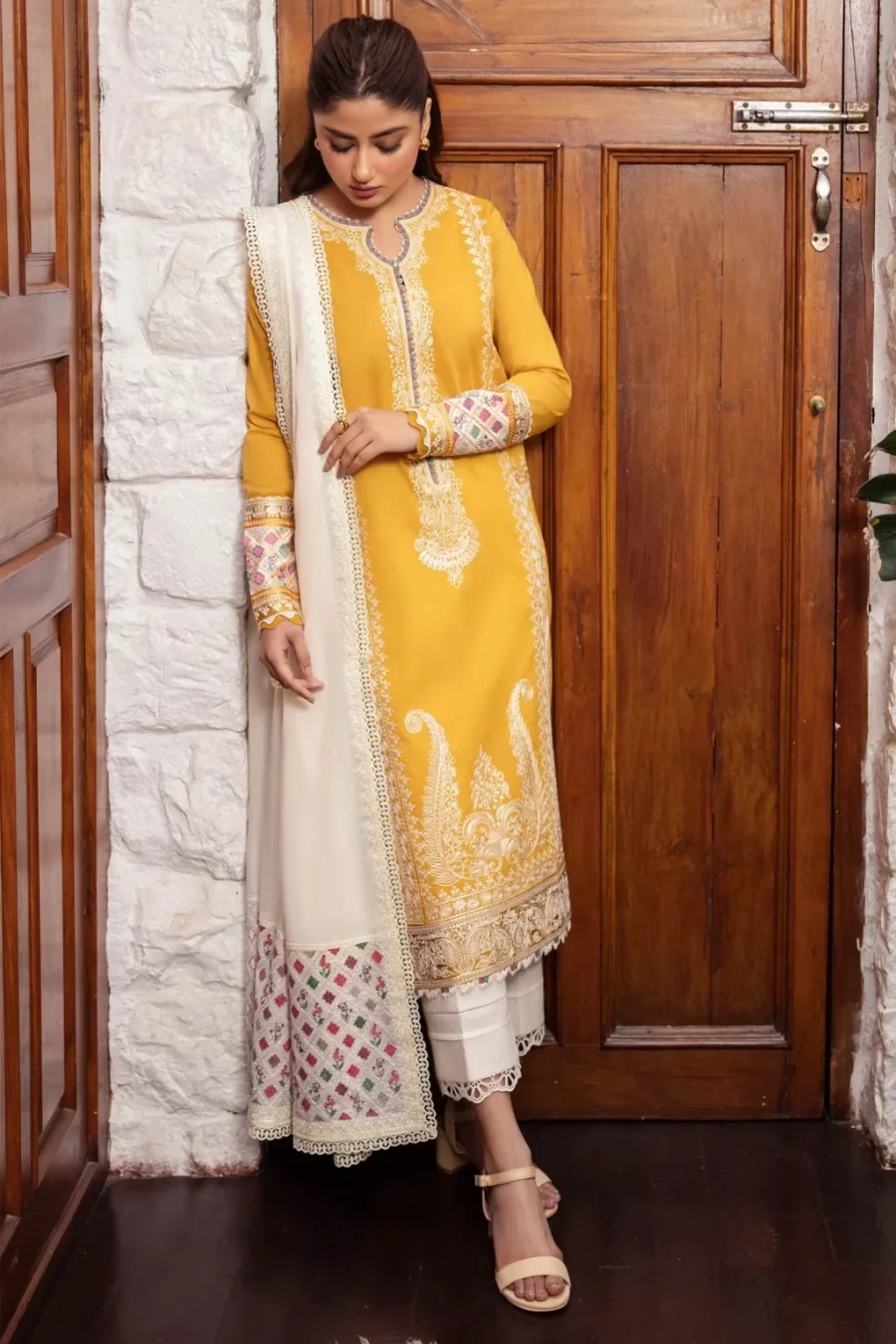 Discover our 100% Original Guaranteed unstitched dress with embroidered lawn panels, satin borders, and a voile duppata.