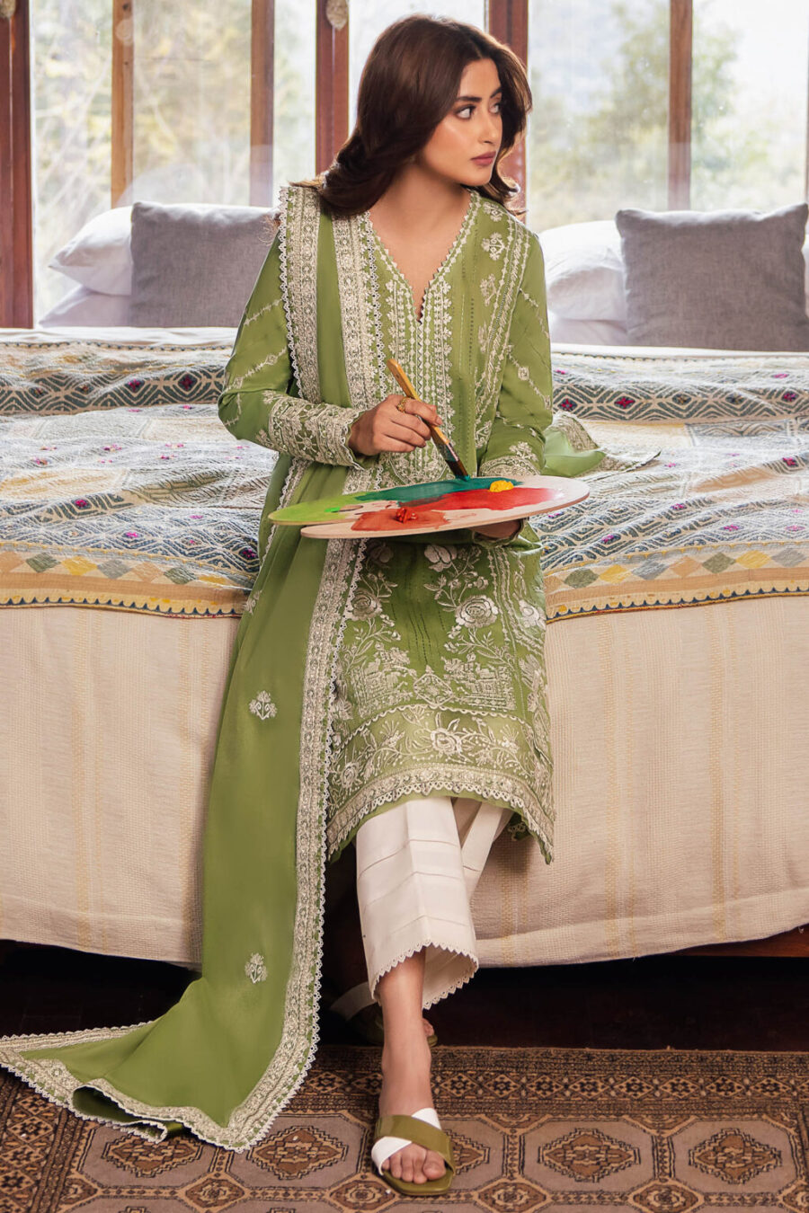 Explore stylish Karachi Pakistani suits featuring unstitched embroidered lawn, organza sleeve and hem borders, voile duppata, and dyed cambric trousers with free shipping and cash on delivery.