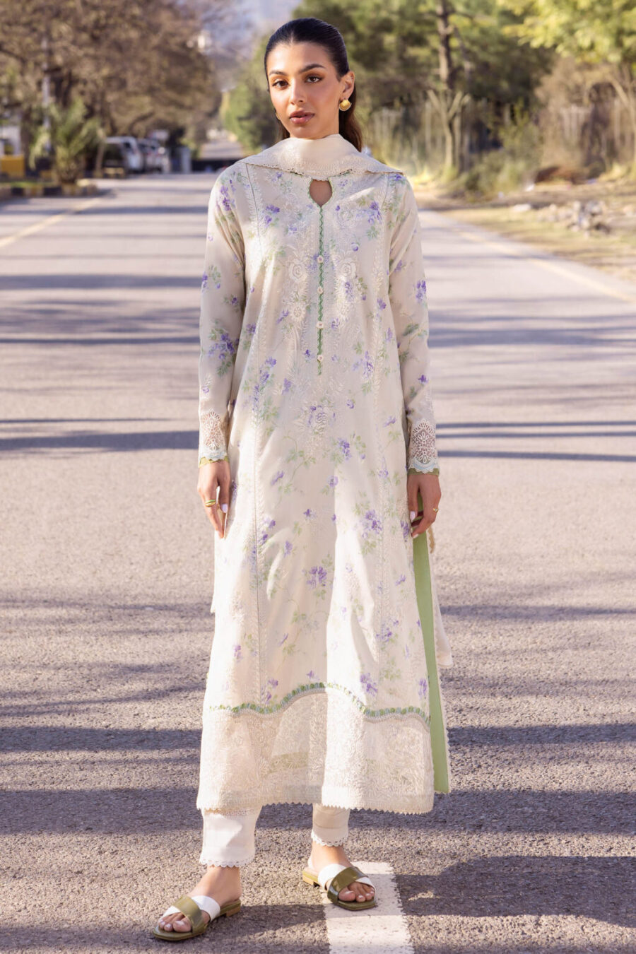 Elevate your wardrobe with our embroidered chiffon dupatta Karachi suit, crafted from lawn, organza, chiffon, and cambric.