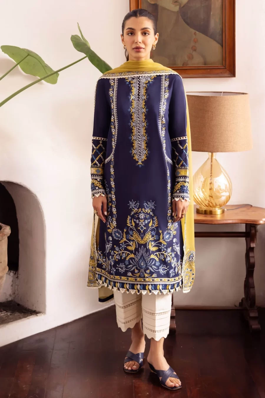 Explore stylish Karachi Pakistani suits featuring unstitched embroidered lawn, satin sleeve and hem borders, chiffon duppata, and dyed cambric trousers with free shipping and cash on delivery.