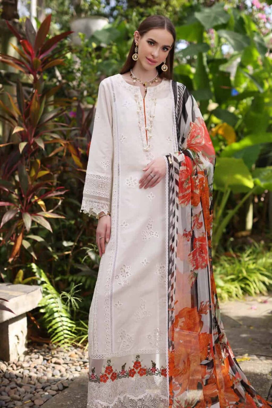 Indulge in elegance with FabCollection's unstitched Pakistani suits for women. Laser & Schiffli embroidery, dyed cambric trouser, dupatta. Buy online now!