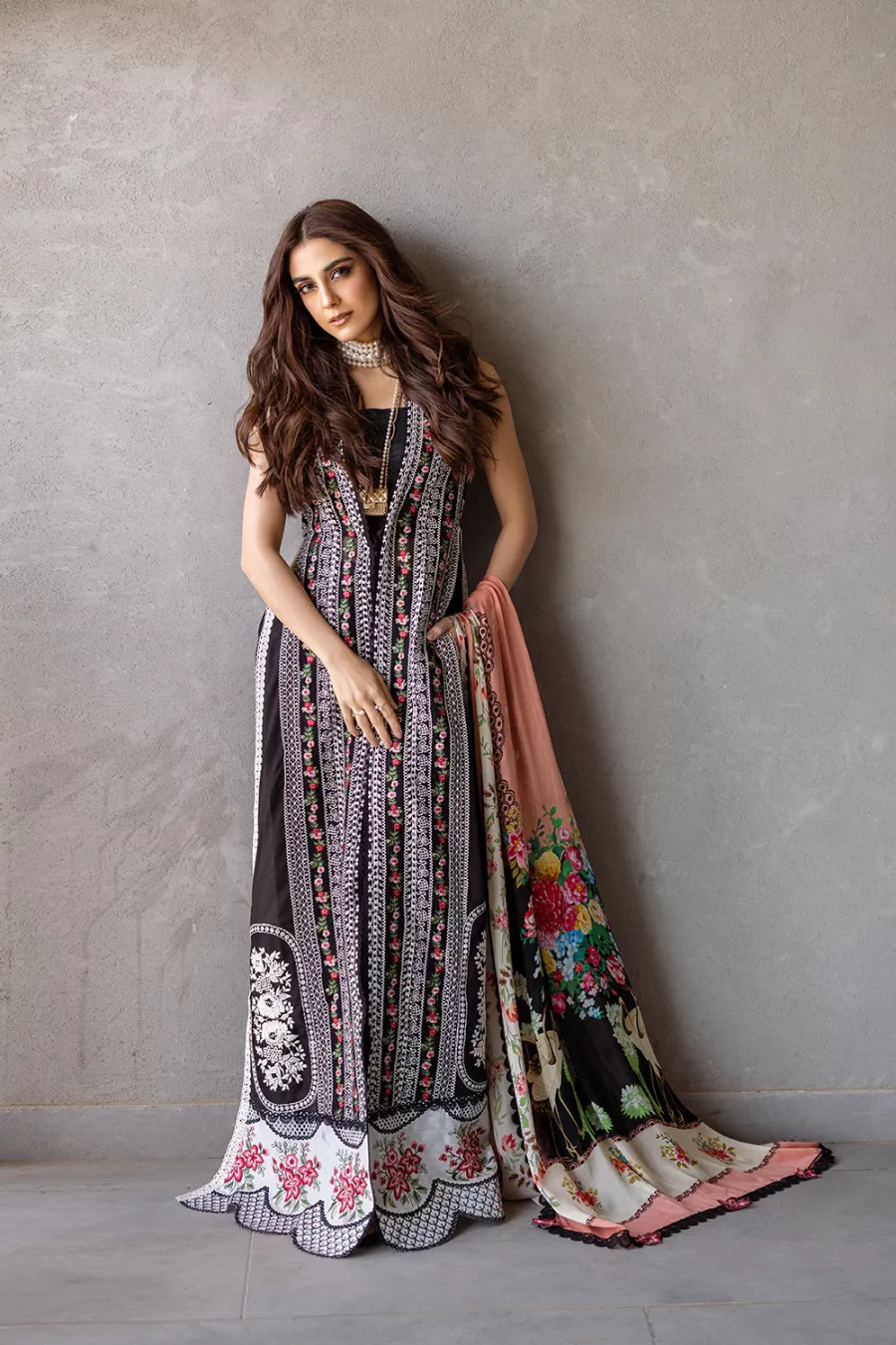 Explore unstitched Pakistani suits. Includes dyed Schiffli front, silk dupatta, cambric trouser, and organza borders. Perfect for elegance and charm. Buy now!