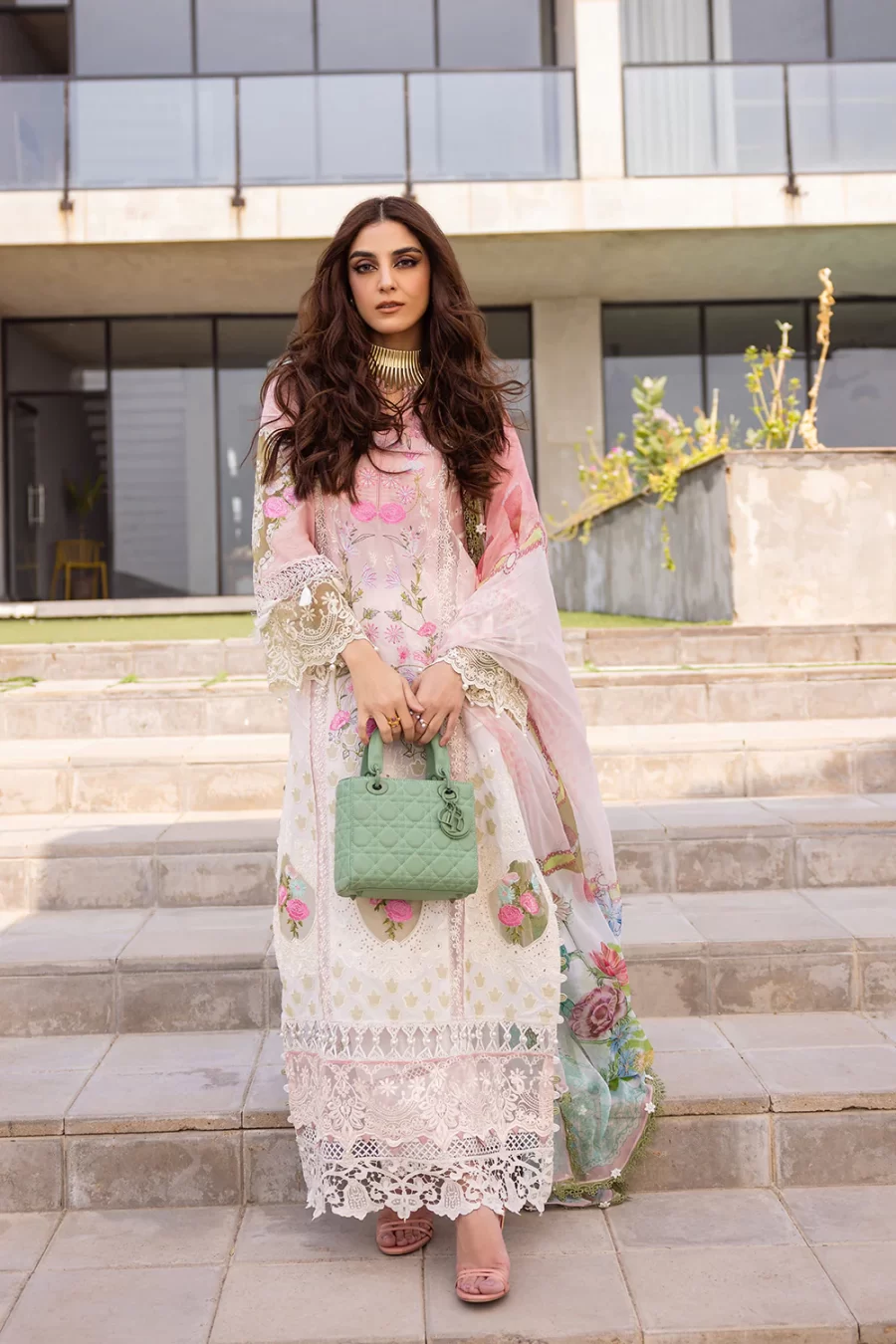 Buy Pakistani suits online. 100% original unstitched material: embroidered lawn, chiffon dupatta, cambric trouser. Perfect for elegance and style.