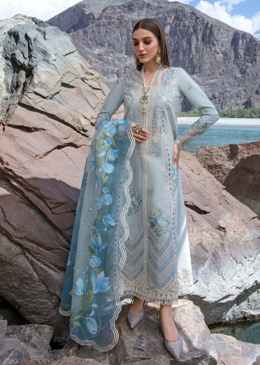 Discover Fabcollection's ice blue unstitched Pakistani suits with intricate embroidery, laser appliqued daman extensions, and a color blocked floral dupatta.