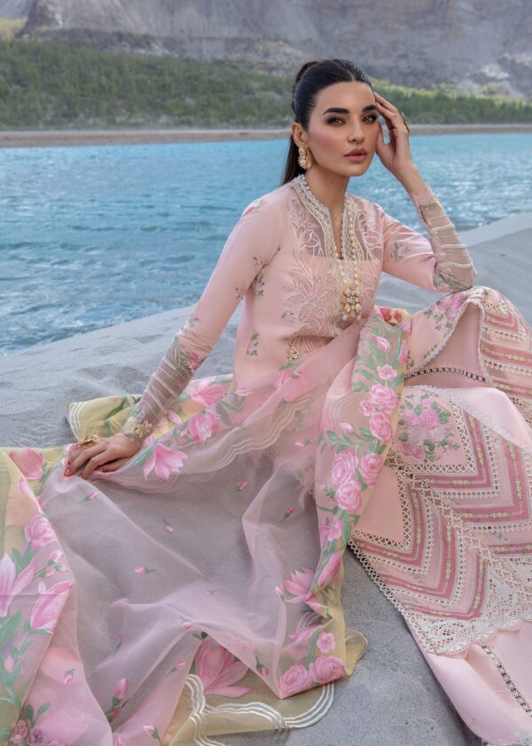 Stunning sorbet pink unstitched Pakistani suits from Fabcollection. Features embroidered panels, two-colored laser appliqued daman extensions, and a printed dupatta.