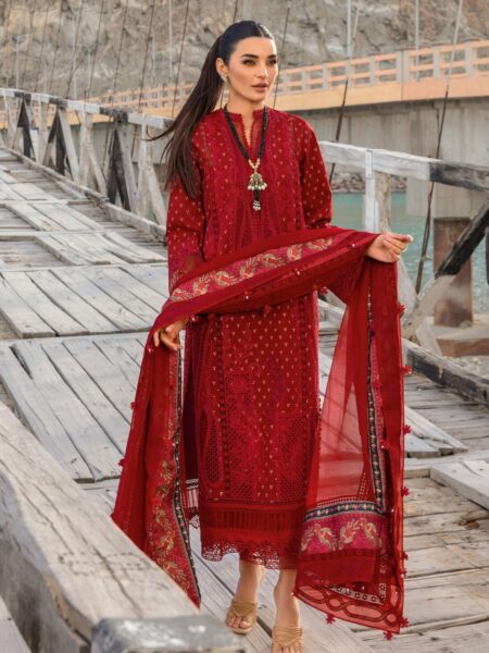 Discover Fabcollection's Ruby suit with hand-printed marori work, organza appliques, embroidered necklines, and a printed silk dupatta. Buy Pakistani suits online.