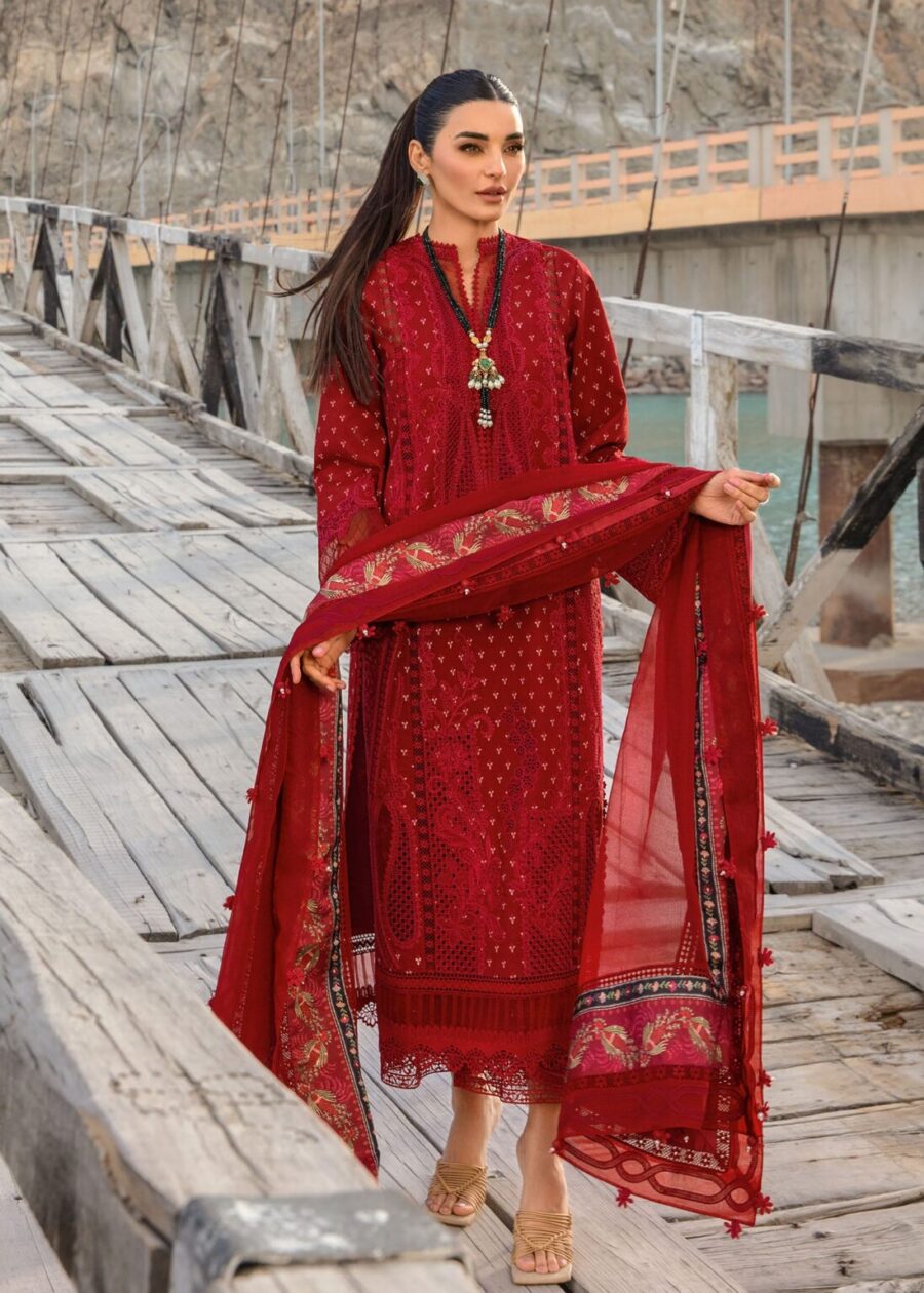 Discover Fabcollection's Ruby suit with hand-printed marori work, organza appliques, embroidered necklines, and a printed silk dupatta. Buy Pakistani suits online.