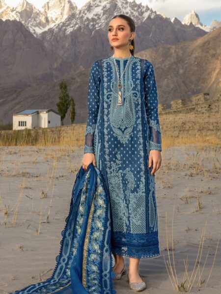 Discover Fabcollection's cobalt unstitched Pakistani suits with hand-printed marori work, organza appliques, and embroidered borders for a refined look.