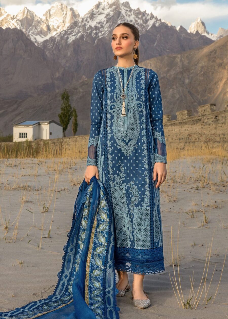 Discover Fabcollection's cobalt unstitched Pakistani suits with hand-printed marori work, organza appliques, and embroidered borders for a refined look.