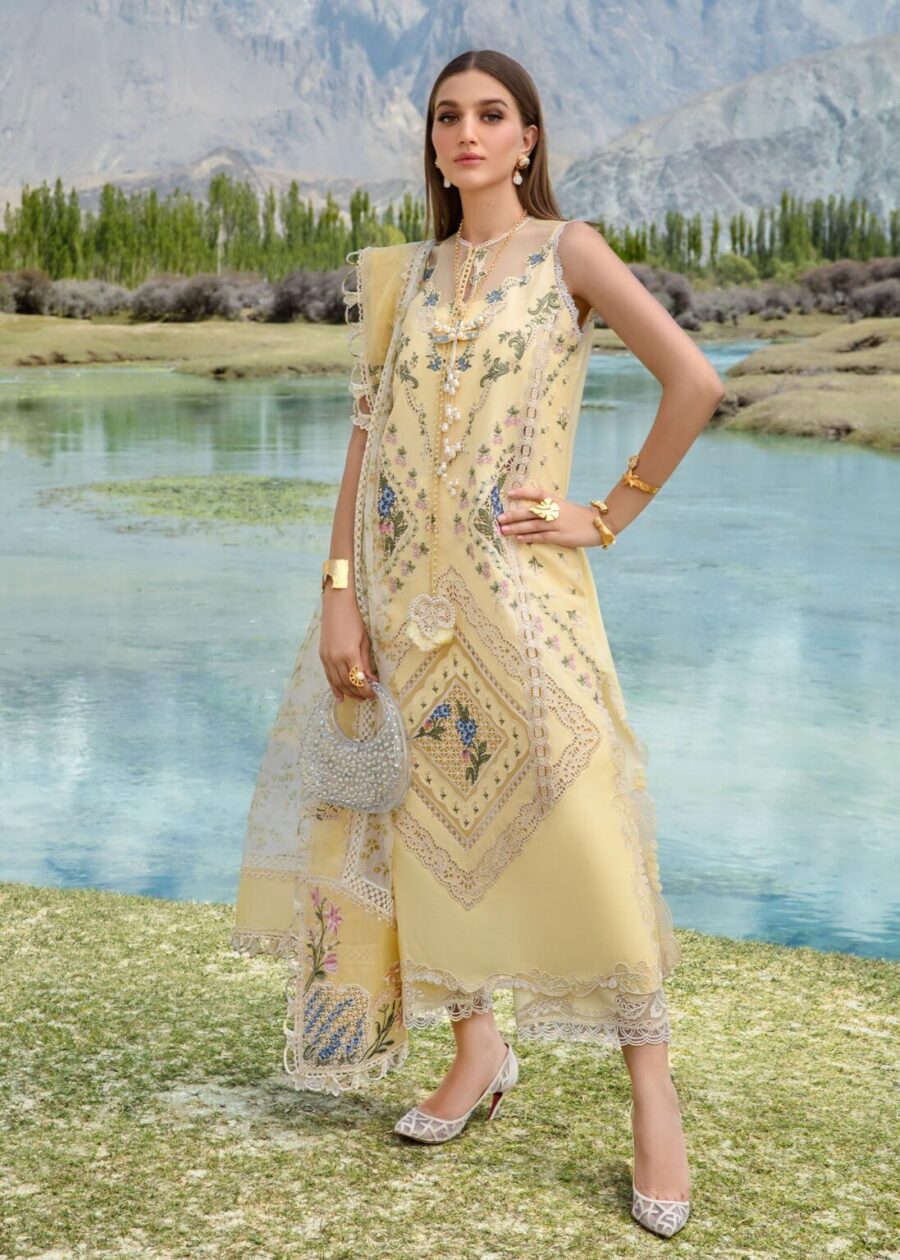 Discover Fabcollection's yellow unstitched Pakistani suits with intricate ghaara embroidery, cutwork, lace inserts, and an embroidered dupatta.