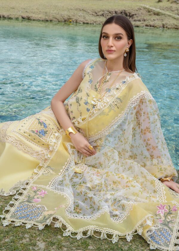 Premium yellow unstitched Pakistani suits from Fabcollection. Includes embroidered borders, ghaara work, and a printed woven net dupatta for a refined look.