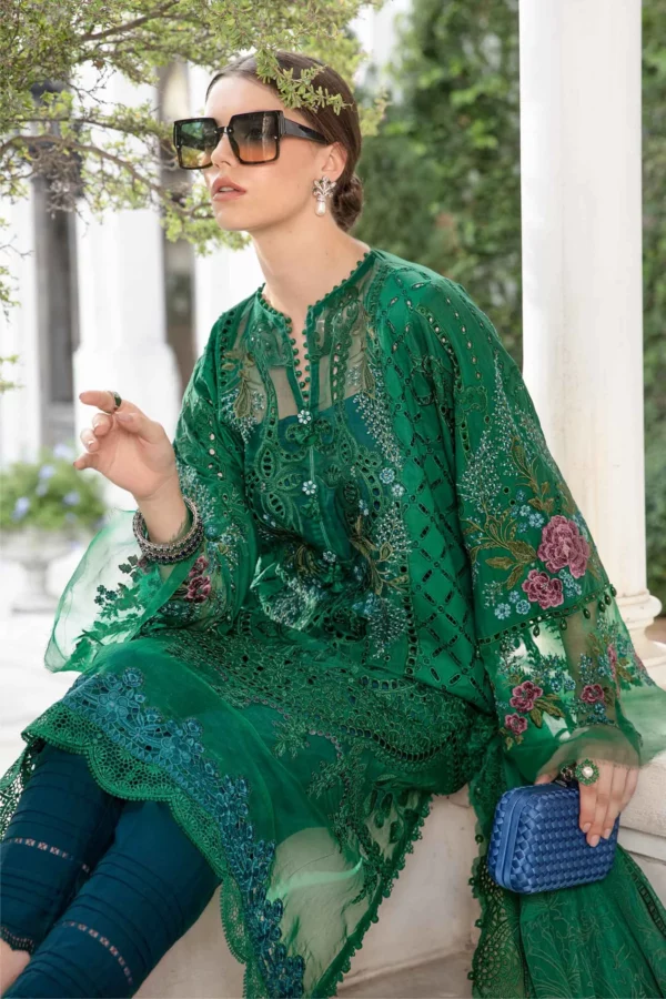 Experience luxury with Fabcollections' green unstitched Pakistani suit, showcasing embroidered organza neck patch, lawn side panels, and net dupatta.