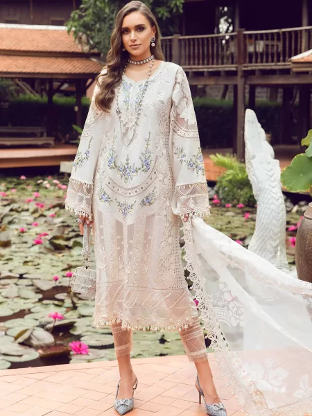 Discover Fabcollections' off white unstitched Pakistani suit featuring embroidered organza side panels patch and 3D flowers for a sophisticated look.