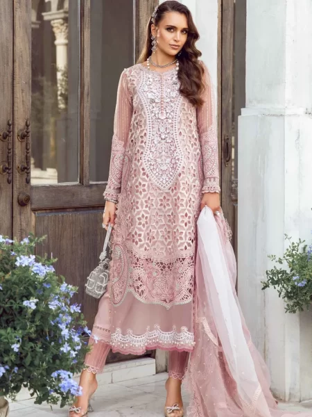 Discover Fabcollections' pink unstitched Pakistani suit with embroidered organza neck patch, 3D flowers, and a printed organza dupatta.