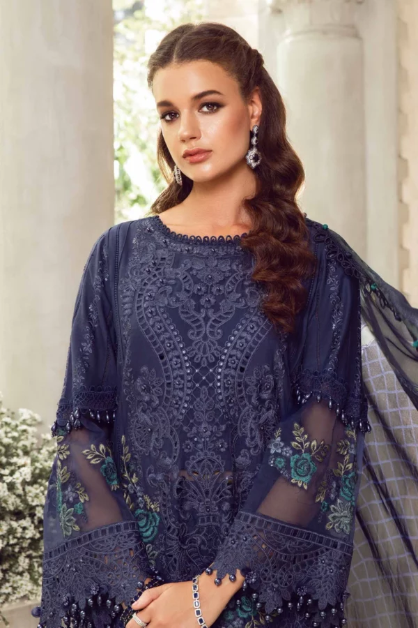 Indulge in the sophistication of our navy blue unstitched dress, showcasing intricate lawn embroidery and a medium silk dupatta for a refined style.