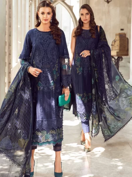 Discover Fabcollections' unstitched Pakistani suits featuring embroidered organza neck patch, 3D floral side panel, and printed silk dupatta in navy blue.