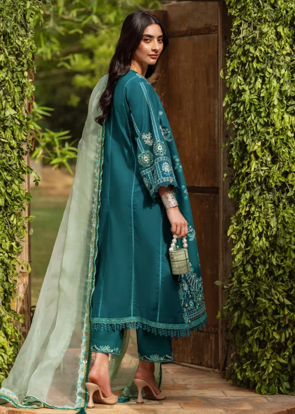 Explore Fabcollections' bohemian chic emerald daily wear dress material, featuring detailed borders and neckline for a classic look.