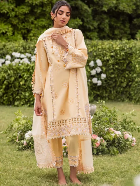 Discover Fabcollection's summer-ready butter yellow unstitched Pakistani suit, complete with embroidered lawn sleeves and khaddi net dupatta.